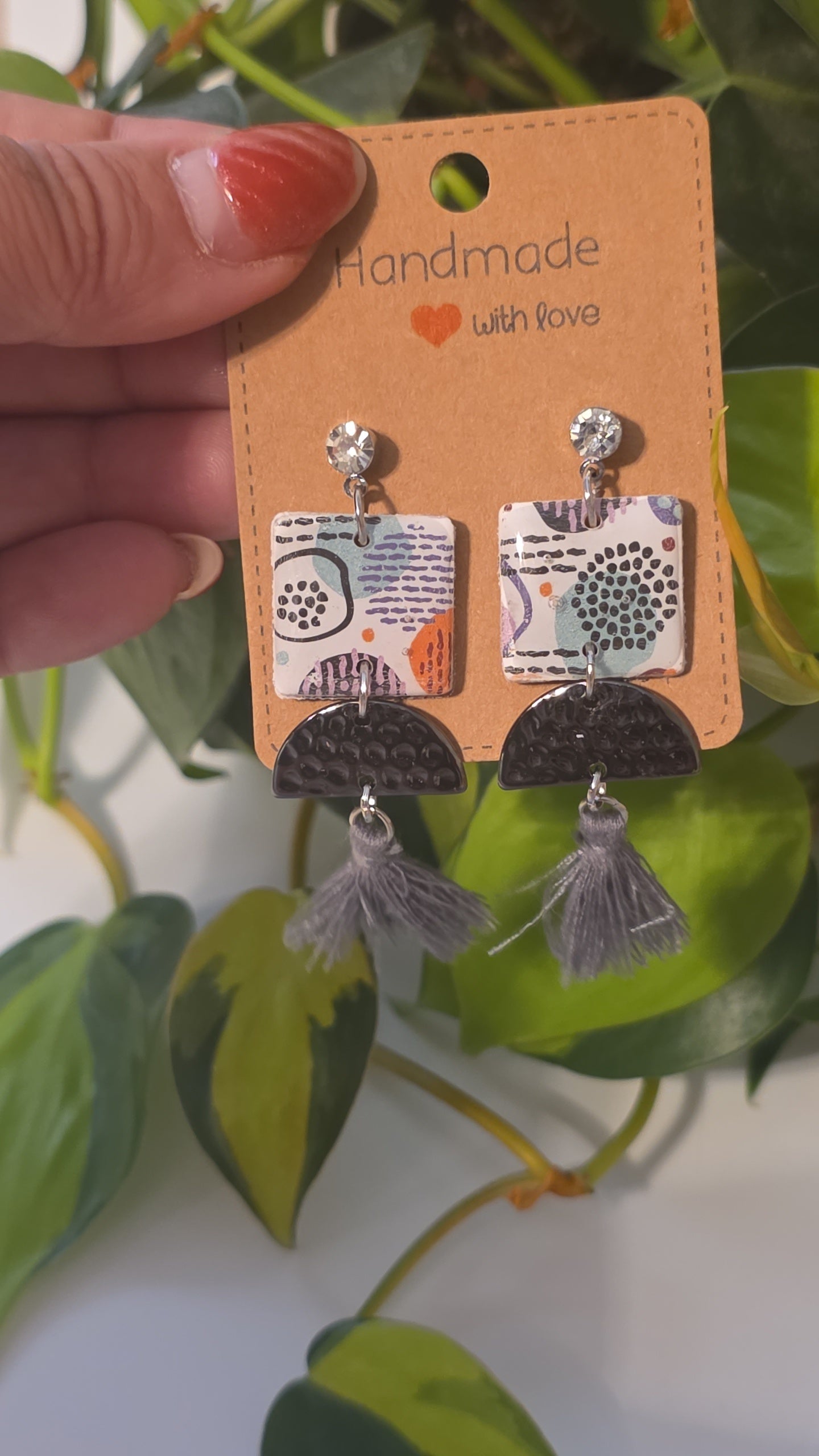 Silver geometric shape earrings with tassles